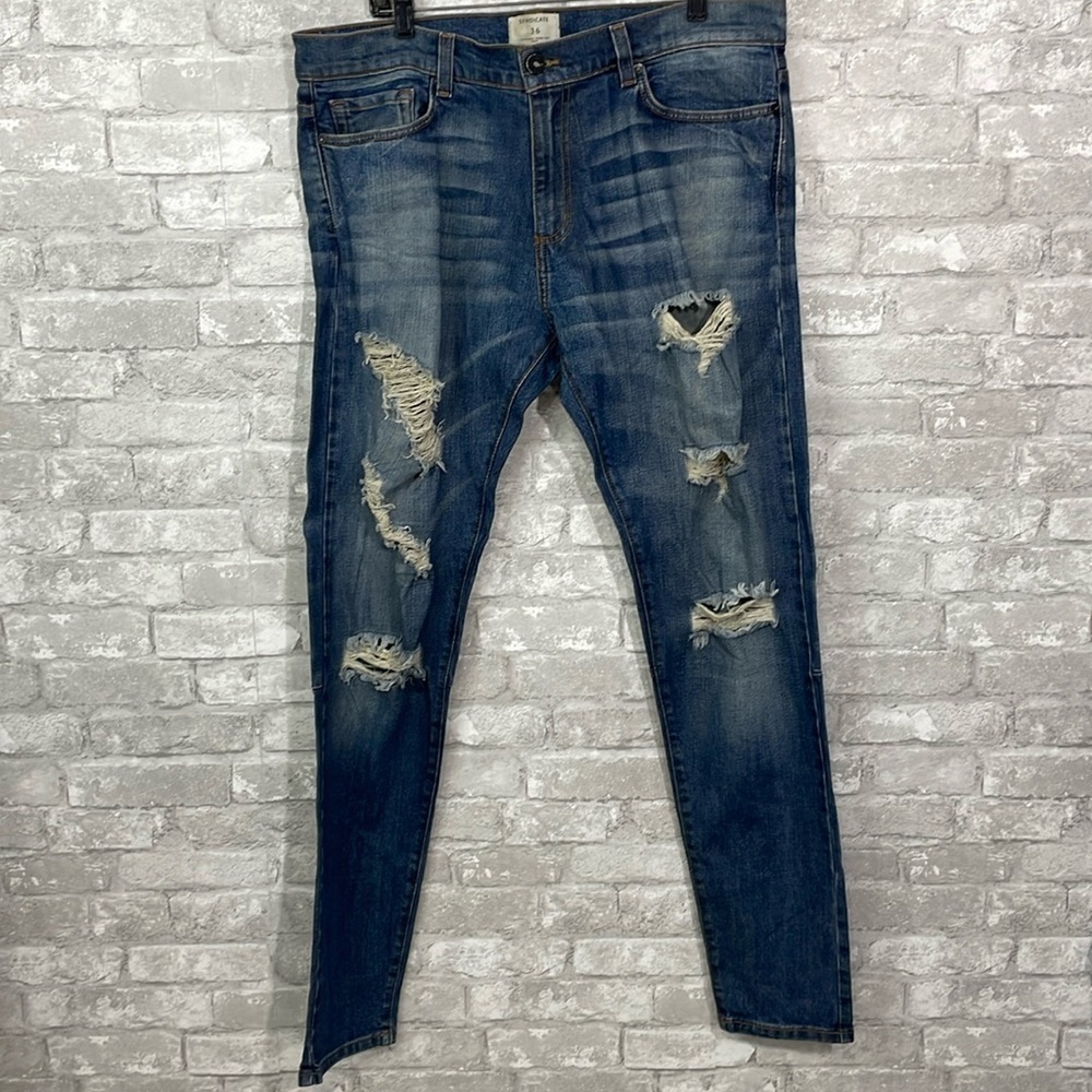 SYNDICATE Distressed Slim Tapered Leg Jeans